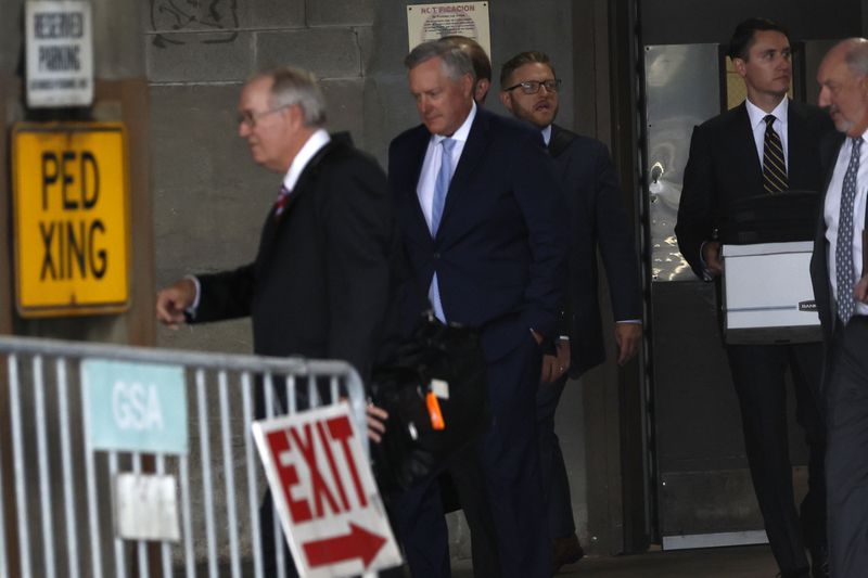 George Terwilliger (far right) is shown leaving the federal courthouse in Atlanta with his client, former White House Chief of Staff Mark Meadows (second from left). Terwilliger has contributed to Republican causes and candidates over the years.
Miguel Martinez /miguel.martinezjimenez@ajc.com