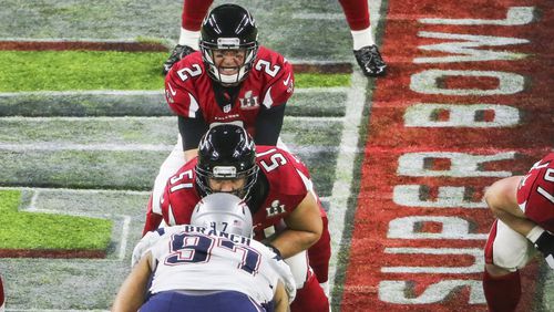 Falcons quarterback Matt Ryan commanding the drive at mid-field in the first half of the 2017 Super Bowl against the New England Patriots at NRG Stadium in Houston.