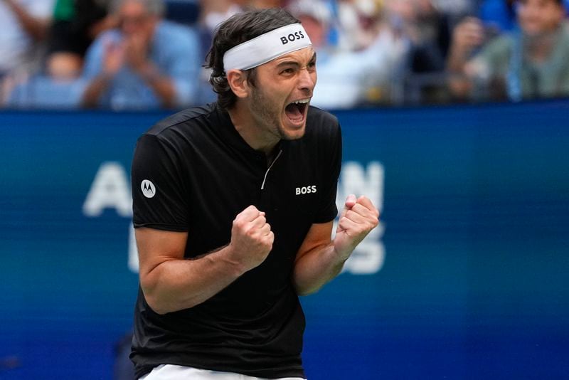 Taylor Fritz, of the United States, reacts after defeating Alexander Zverev, of Germany, during the quarterfinals of the U.S. Open tennis championships, Tuesday, Sept. 3, 2024, in New York. (AP Photo/Kirsty Wigglesworth)