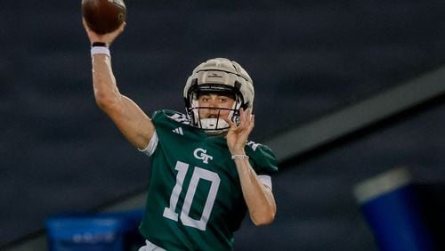 Georgia Tech quarterback Haynes King (10) attempts a pass to a wide receiver during the second day of football practice at the Brock Indoor Practice Facility on Thursday, July 25, 2024, in Atlanta. (Miguel Martinez / AJC)