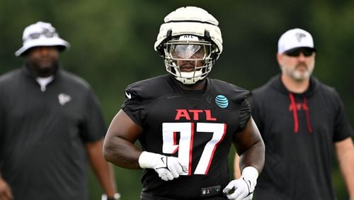 Defensive lineman Grady Jarrett (97) is back on the field for the Falcons during the first practice of training camp Thursday in Flowery Branch. (Hyosub Shin / AJC)