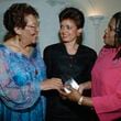 Sculptress Elizabeth Catlett, left, then-Washington D.C. Mayor Sharon Pratt Dixon, center, and then-curator, division of community life, Smithsonian institution Bernice Johnson Reagon chat during the reception at the Candace awards on June 25, 1991 in New York. Reagon, a musician and scholar who used her rich, powerful contralto voice in the service of the American Civil Rights Movement and human rights struggles around the world, died on July 16, 2024, according to her daughter's social media post. She was 81. (AP Photo/Chrystyna Czajkowsky, file)