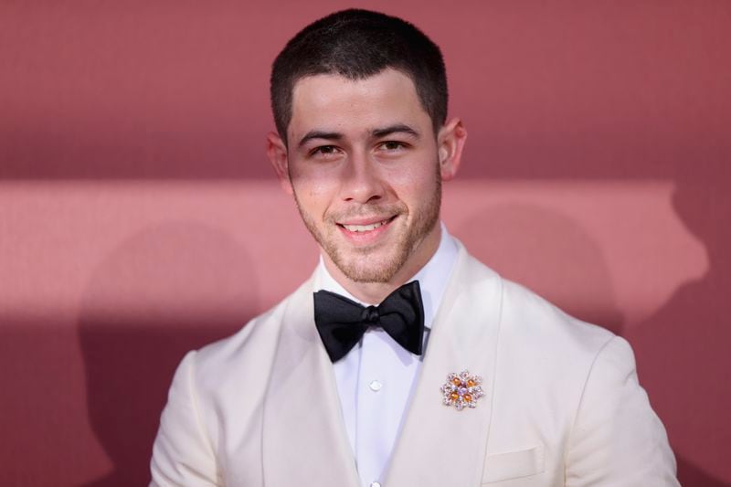 Nick Jonas poses for photographers upon arrival at the amfAR Cinema Against AIDS benefit at the Hotel du Cap-Eden-Roc, during the 77th Cannes international film festival, Cap d'Antibes, southern France, Thursday, May 23, 2024. (Photo by Vianney Le Caer/Invision/AP)