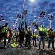 FILE - United Auto Workers members strike outside of Ford's Kentucky Truck Plant in Louisville, Ky. on Oct. 12, 2023. (Michael Clevenger/Courier Journal via AP, File)