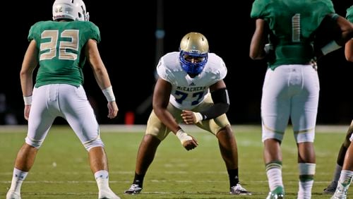 McEachern offensive lineman Chuma Edoga (77) is shown before a play against Buford Friday in Buford, Ga., Sept. 5, 2014. Buford would win 27-20. JASON GETZ / SPECIAL