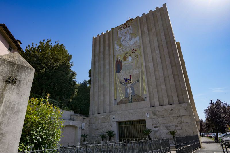 A mosaic by ex-Jesuit artist Marko Rupnik is seen on the main facade of the Church of Our Lady of the Canadian Martyrs, in Rome Friday, June 28, 2024. Five women urged Catholic bishops around the world to remove from their churches Rupnik's mosaics after they accused him of psychologically, spiritually and sexually abusing them. (AP Photo/Andrew Medichini)