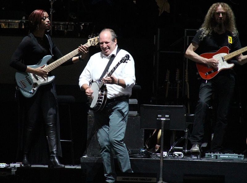  Zimmer, with Yolanda Charles and Guthrie Govan behind him, played several instruments during the show. Photo: Melissa Ruggieri/AJC