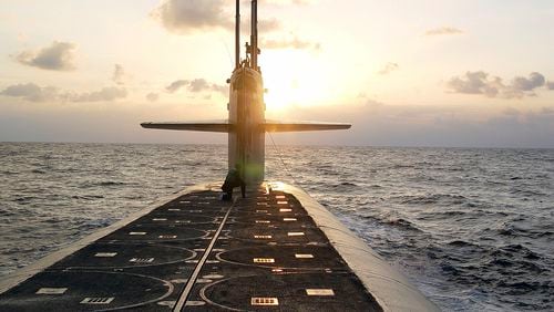 In this Jan. 9, 2008 photo released by the U.S. Navy, the Ohio-class ballistic-missile submarine USS Wyoming approaches Naval Submarine Base Kings Bay, Ga. (Lt. Rebecca Rebarich/U.S. Navy via AP)