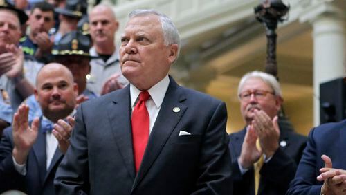 Gov. Nathan Deal, who earlier this month announced a $79 million plan to give 20 percent pay raises to more than 3,300 state law enforcement officers, has unveiled a plan to increase the pay for about 300 additional officers by 10 percent. BOB ANDRES /BANDRES@AJC.COM