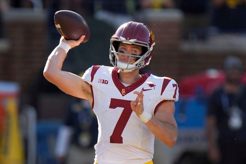 Southern California quarterback Miller Moss throws against Michigan in the first half of an NCAA college football game in Ann Arbor, Mich., Saturday, Sept. 21, 2024. (AP Photo/Paul Sancya)