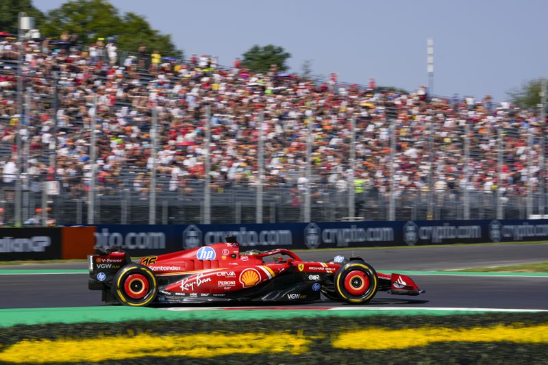 Ferrari driver Charles Leclerc of Monaco steers his car during the first free practice ahead of the Formula One Italian Grand Prix race at the Monza racetrack, in Monza, Italy, Friday, Aug. 30, 2024. (AP Photo/Luca Bruno)