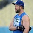 Los Angeles Dodgers pitcher Clayton Kershaw stands on the field during practice in preparation for Game 1 of a baseball NL Division Series against the San Diego Padres in Los Angeles, Friday, Oct. 4, 2024. (AP Photo/Ashley Landis)