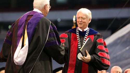 Former University of Georgia president Michael Adams, right, shown in this AJC file photo, has been named chancellor of Pepperdine University. Adams led UGA from 1997 to 2013. He begins his new position at the California institution August 1. JASON GETZ / JGETZ@AJC.COM