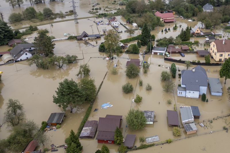 An aerial view of a flooded neighborhood in Ostrava, Czech Republic, Monday, Sept. 16, 2024. (AP Photo/Darko Bandic)