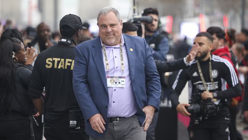 Atlanta United President and CEO Garth Lagerwey walks with the team as they arrive before their MLS season opener against San Jose at Mercedes-Benz Stadium, Saturday, Feb. 25, 2023, in Atlanta. Jason Getz / Jason.Getz@ajc.com)
