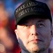 Tesla and SpaceX CEO Elon Musk listens as Republican presidential nominee former President Donald Trump speaks at a campaign event at the Butler Farm Show, Saturday, Oct. 5, 2024, in Butler, Pa. (AP Photo/Alex Brandon)