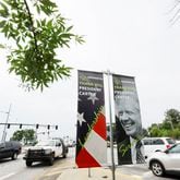 A series of banners pay tribute to President Jimmy Carter at the exit on Jimmy Carter Boulevard on Tuesday, May 23, 2023. The initiative, conceived by Gateway85 CID, showcases the enduring legacy of President Jimmy Carter. Miguel Martinez /miguel.martinezjimenez@ajc.com