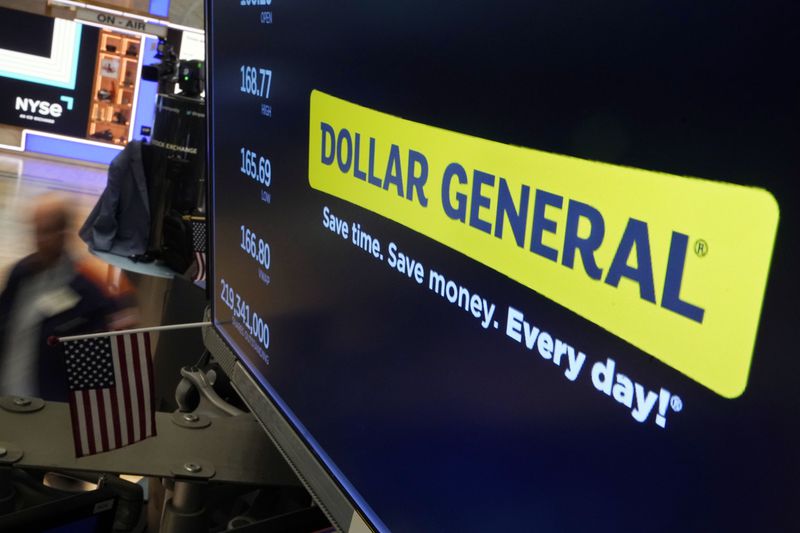 FILE - The logo for Dollar General appears on a screen above a trading post, on the floor of the New York Stock Exchange, Thursday, July 13, 2023. (AP Photo/Richard Drew, File)