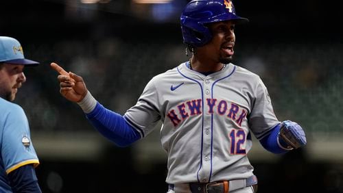 New York Mets' Francisco Lindor gestures to an umpire during the first inning of a baseball game against the New York Mets, Friday, Sept. 27, 2024, in Milwaukee. (AP Photo/Aaron Gash)