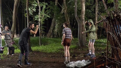 A behind-the-scenes photo of "Stranger Things" from season 3, shot in metro Atlanta. Shown: Shawn Levy, Noah Schnapp, Finn Wolfhard. NETFLIX