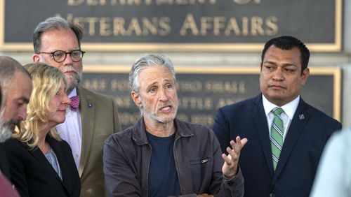 Jon Stewart speaks outside the Department of Veterans Affairs following meetings with officials on Friday, July 26, 2024, in Washington. (AP Photo/Kevin Wolf)