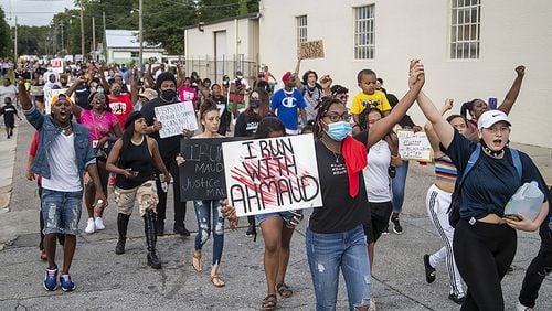 Residents participate in an impromptu peaceful march in Brunswick on Thursday, June 4, 2020. A judge found probable cause against three suspects in the death of Ahmaud Arbery, and so the case will now be bound over to Superior Court.