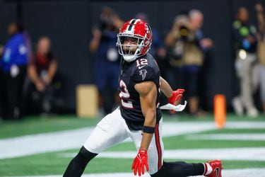 Atlanta Falcons wide receiver KhaDarel Hodge (12) reacts after scoring the game-winning touchdown during overtime against the Tampa Bay Buccaneers on Thursday, October 3, 2024, at Mercedes-Benz Stadium in Atlanta. The Falcons won 36-30.
(Miguel Martinez/ AJC)