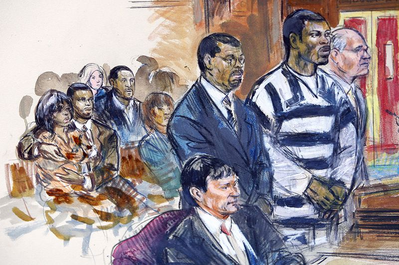 Artist's rendering shows Atlanta Falcons quarterback Michael Vick, wearing a black-and-white prison suit, along with his attorney's Billy Martin (left) and Lawrence Woodward (right) as he is sentenced in Federal Court  in Richmond, Va., Monday, Dec. 10, 2007.