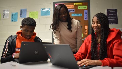 English teacher Dearra Walters works with Parkview High students.