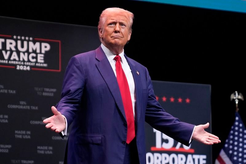 Republican presidential nominee former President Donald Trump arrives to speak about the tax code and manufacturing at the Johnny Mercer Theatre Civic Center, Tuesday, Sept. 24, 2024, in Savannah, Ga. (AP Photo/Evan Vucci)