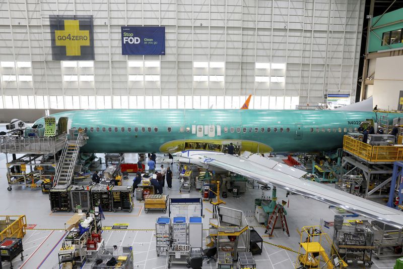 A Boeing 737 MAX aircraft is shown on the assembly line during a brief media tour at the Boeing facility in Renton, Wash., Tuesday, June 25, 2024. (Jennifer Buchanan/The Seattle Times via AP, Pool)
