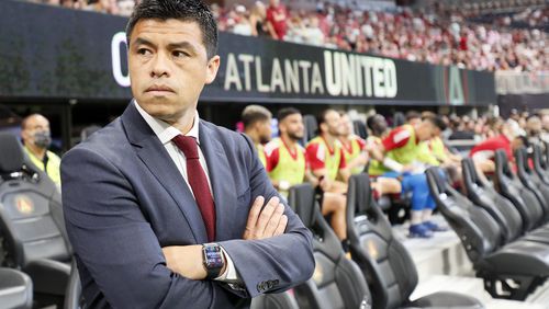 Atlanta United manager Gonzalo Pineda watches his team coming out the tunnel before the game against Orlando City at Mercedes-Benz Stadium on Sunday, July 17, 2022. Miguel Martinez /Miguel.martinezjimenez@ajc.com