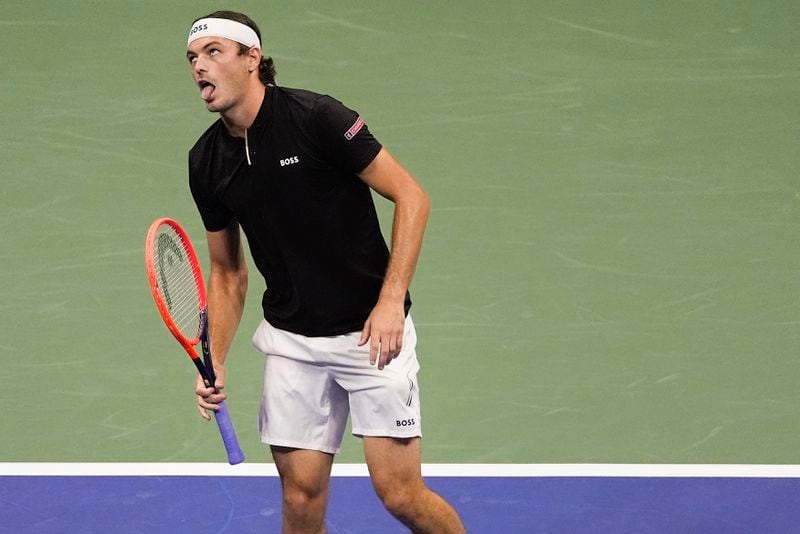 Taylor Fritz, of the United States, reacts in the first set against Frances Tiafoe, of the United States, during the men's singles semifinal of the U.S. Open tennis championships, Friday, Sept. 6, 2024, in New York. (AP Photo/Julia Nikhinson)