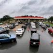 Cars wait in line to get into the parking lot for gas at Costco, Monday, Oct. 7, 2024, in Altamonte Springs, Fla., as residents prepare for the impact of approaching Hurricane Milton. (Joe Burbank/Orlando Sentinel via AP)