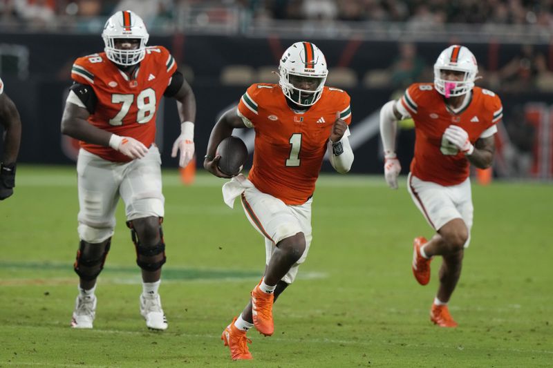 Miami quarterback Cam Ward (1) runs with the ball during the second half of an NCAA college football game against Virginia Tech , Friday, Sept. 27, 2024, in Miami Gardens, Fla. (AP Photo/Marta Lavandier)