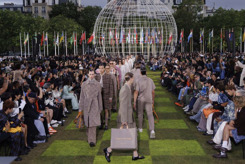 Models wear creations as part of the Louis Vuitton Spring Summer 2025 collection, that was presented in Paris, Tuesday, June 18, 2024. (Photo by Vianney Le Caer/Invision/AP)