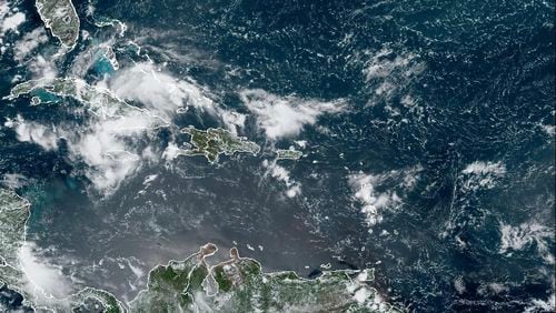 A satellite image captured on Friday, August 2, 2024, shows "Potential Tropical Cyclone Four" in the Caribbean Sea. The storm could bring damaging winds, rain and flooding to Florida and other parts of the Southeast.