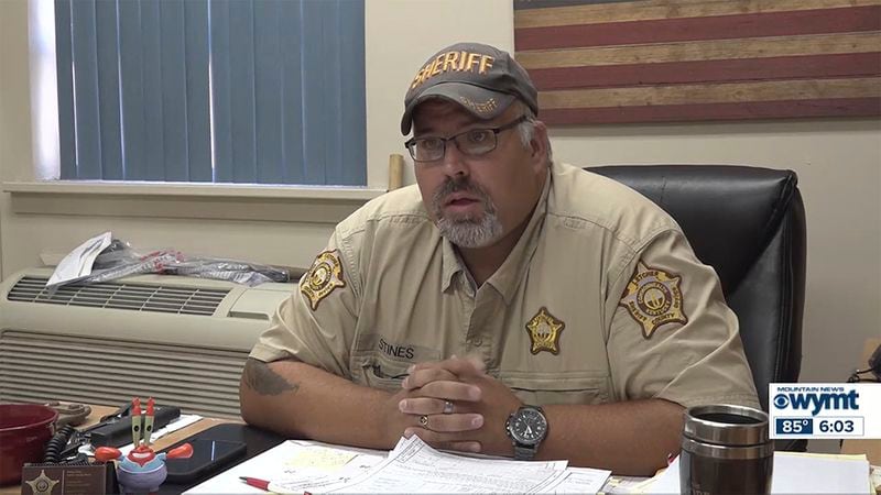 Letcher County Ky Sheriff Shawn M. Stines. Here is a cutline: In this screenshot provided by WYMT-TV, Letcher County Sheriff Shawn M. Stines is shown during an interview in Whitesburg, Ky., on Aug. 14, 2024. (WYMT-TV via AP)