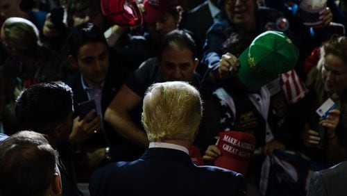 
                        FILE — Former President Donald Trump greets supporters at a rally in Manchester, N.H., April 27, 2023. The former president made it clearer than ever this week that on issues including Ukraine, the economy and the rule of law, his return to office would lead to a sharp departure from core American values. (Sophie Park/The New York Times)
                      