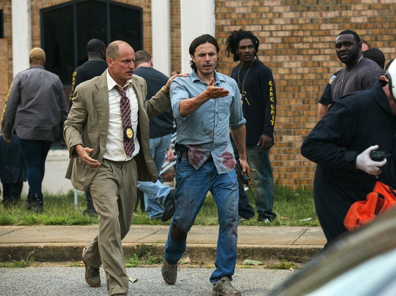 Woody Harrelson, left, and Casey Affleck star in “Triple 9," a cop thriller shot and set in Atlanta. (Bob Mahoney/Open Road Films via AP)