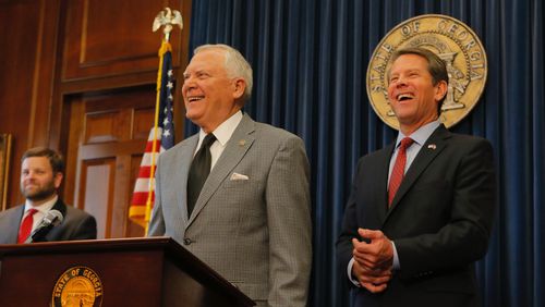 Then-Gov. Nathan Deal and Brian Kemp, then secretary of state, at a news conference on  Nov. 8, 2018. Kemp, now governor, is running for reelection against Democrat Stacey Abrams. (Bob Andres/AJC)