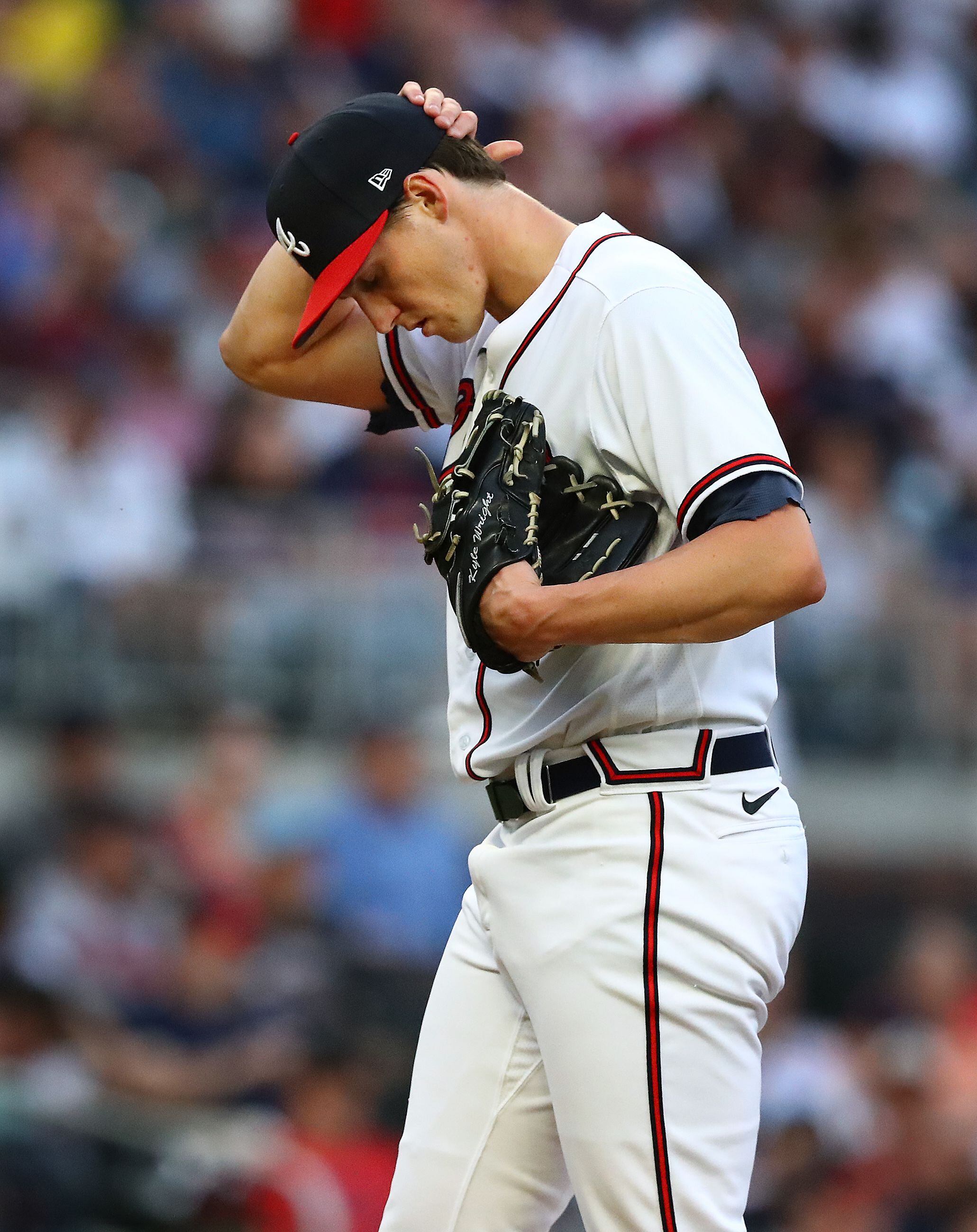 he Atlanta Braves Celebrating Kyle Wright and His Red Jersey #30