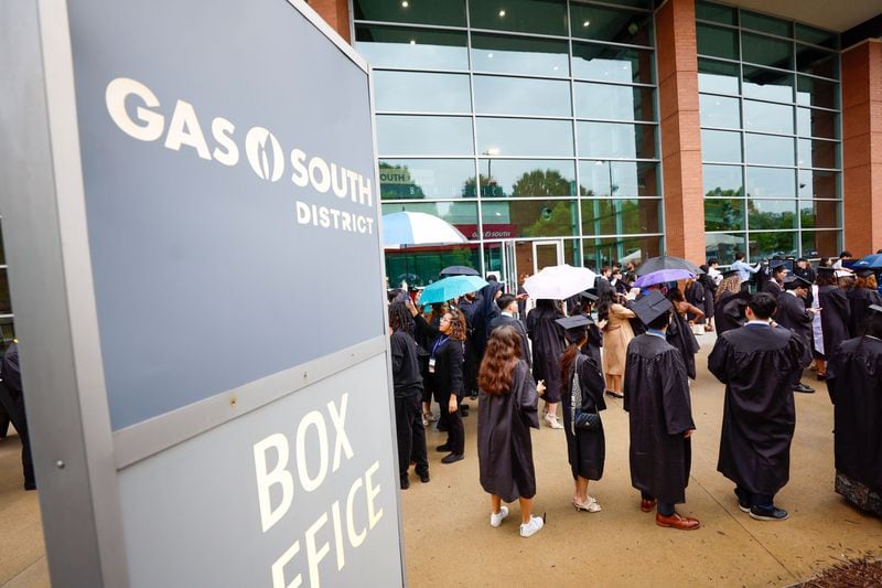 Emory students go through the security check-in for Emory University's 179th commencement ceremony at Gas South Arena on Monday, May 13, 2024, in Duluth. The school has experienced numerous demonstrations in solidarity with Palestinians. University leaders moved the commencement location to Gas South due to safety considerations. (Miguel Martinez / AJC)