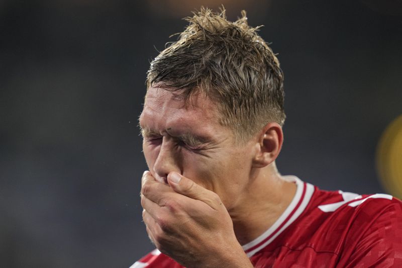 Denmark's Jannik Vestergaard is dejected after a round of sixteen match between Germany and Denmark at the Euro 2024 soccer tournament in Dortmund, Germany, Saturday, June 29, 2024. (AP Photo/Andreea Alexandru)