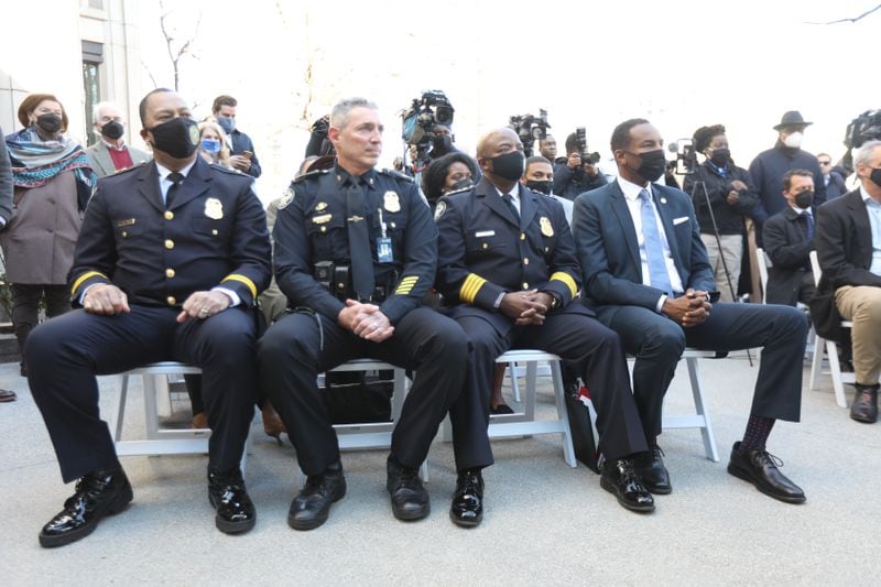 (Left to right) Deputy Chief Timothy D. Peek, Zone 2 Commander Major Andrew Senzer, then-Atlanta Chief Police Rodney Bryant, and Atlanta Mayor Andre Dickens listen to the opening remarks during the unveiling of the unveil new Buckhead mini-precinct on Thursday, January 13, 2022 Miguel Martinez for The Atlanta Journal-Constitution 