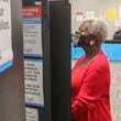 May 2, 2022 Atlanta: Josephine Reed-Taylor casts her ballot as did other voters that gathered at the Buckhead Library located at 269 Buckhead Ave NE in Atlanta for early voting on Monday May 2, 2022. Three weeks of early voting began Monday for voters who want to cast their ballots in the Georgia primary before election day on May 24. In-person early voting is usually the most popular way of participating in Georgia elections, providing at least 17 days when voters can pick a time that fits their schedule. About 54% of voters cast ballots in advance during the 2020 presidential election. The primary includes races for Georgia governor, the U.S. Senate, statewide offices and the General Assembly. Early voting locations, hours and sample ballots are available online on the state’s My Voter Page at mvp.sos.ga.gov. The primary might be the first time many voters go to the polls since the General Assembly passed Georgia’s new voting law in March 2021, though some cities held local elections in the fall. Changes to voting laws affect early voting in several ways. The minimum early voting hours are set at 9 a.m. to 5 p.m., and counties can offer up to 12 hours of daily early voting, from 7 a.m. to 7 p.m. In previous elections, early voting times were required “during normal business hours,” but those hours weren’t defined. Early voting will also be offered on two Saturdays, and local election offices have the option of providing voting hours on two Sundays as well. Before the law, one Saturday of early voting was required. Early voting is available from May 2 to May 20. All voters also have the option of casting absentee ballots in advance of election day, but the rules have changed. Under Georgia’s voting law, voters can no longer request an absentee ballot online without signing a paper form, meaning they’ll need access to a printer in most circumstances. A driver’s license or other form of ID is also required. The state’s new absentee ballot request website is securemyabsenteeballot.sos.ga.gov.
The deadline to request an absentee ballot is now 11 days before election day, on May 13 for the primary, and completed ballots must be received at local election offices before polls close. Voters can return absentee ballots through the mail or in drop boxes, but fewer ballot drop boxes are available this year, and there won’t be an option during the final days of the election. Georgia’s voting law prohibits drop boxes from being used except during early voting hours, and they can only be located inside early voting locations. The number of drop boxes in each county is capped at one for every 100,000 active voters or the number of early voting locations, whichever is lower. Every county must install at least one drop box. (John Spink / John.Spink@ajc.com)


