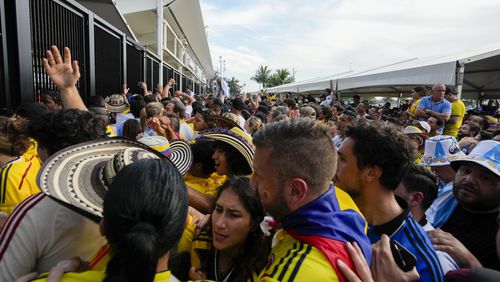 FILE - Fans wait to enter the stadium prior to the Copa America final soccer match between Argentina and Colombia in Miami Gardens, Fla., July 14, 2024. (AP Photo/Lynne Sladky, File)