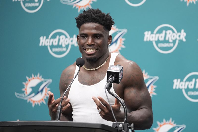 Miami Dolphins wide receiver Tyreek Hill speaks during an NFL football post game news conference, Sunday, Sept. 8, 2024, in Miami Gardens, Fla. The Dolphins defeated the Jaguars 20-17. (AP Photo/Rebecca Blackwell)