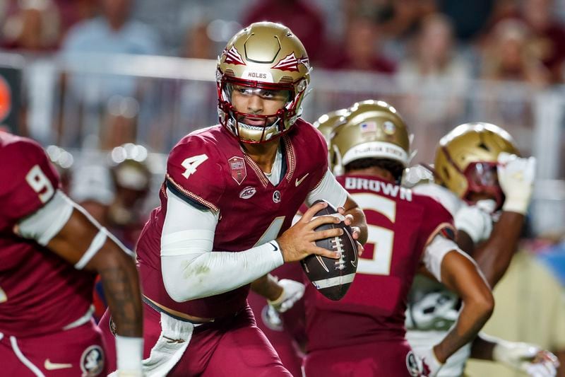 Florida State quarterback DJ Uiagalelei (4) looks for a receiver against Boston College during the first half of an NCAA college football game, Monday, Sept. 2, 2024, in Tallahassee, Fla. (AP Photo/Colin Hackley)