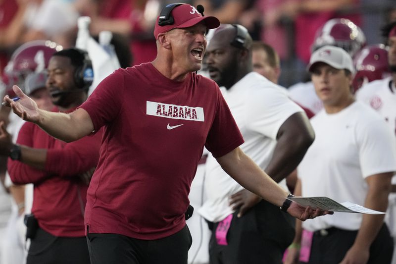 Alabama head coach Kalen DeBoer yells to an official during the second half of an NCAA college football game against Vanderbilt, Saturday, Oct. 5, 2024, in Nashville, Tenn. (AP Photo/George Walker IV)